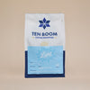 Coffee bag from Ten Boom Coffee Roasters on a beige background